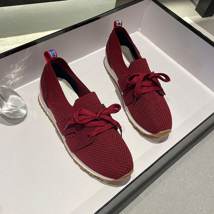 Women's sports sneakers with a breathable knitted upper and elastic accents Lune London