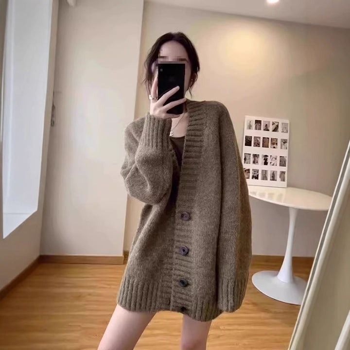 Oversized knitted jacket for women with a deep V-neck and button details Lune London