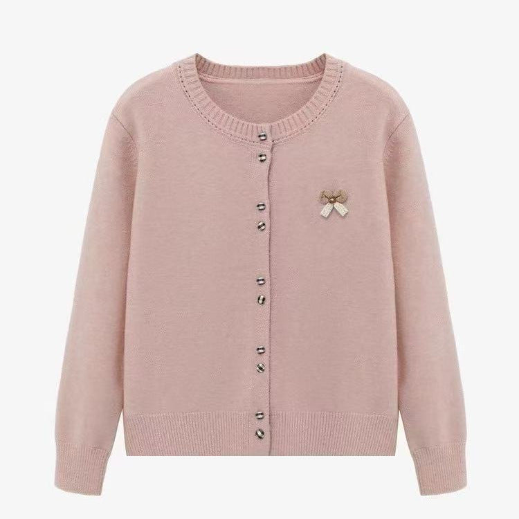 Ladies comfortable knitted cardigan with shiny buttons and decorative application Lune London