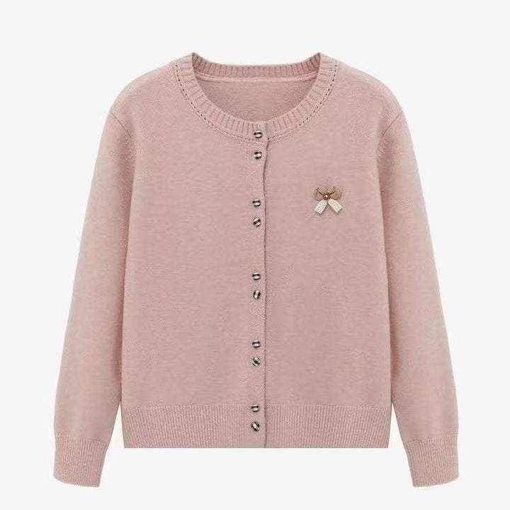 Ladies comfortable knitted cardigan with shiny buttons and decorative application Lune London