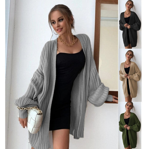 Ladies chunky knit cardigan with a loose fit and modern details Lune London