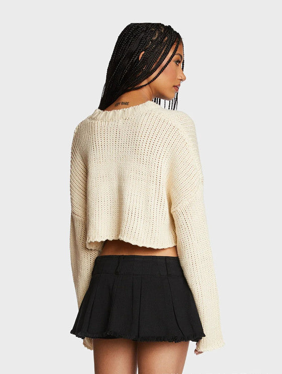 Trendy chunky knit sweater for women with stylish chic star appliqués