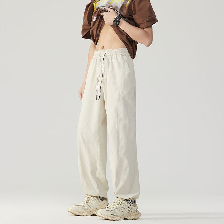 Pantalon de sport respirant pour hommes avec taille ajustable et poches zippées latérales Lune London