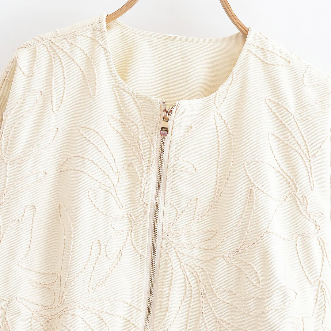 Haut matelassé pour femmes avec broderie florale Chic & Stil