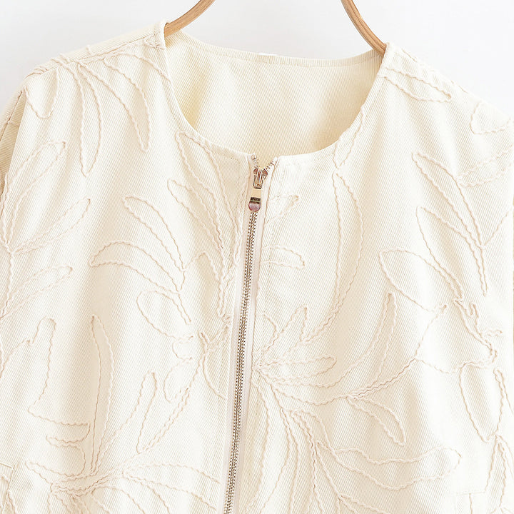 Haut matelassé pour femmes avec broderie florale Chic & Stil
