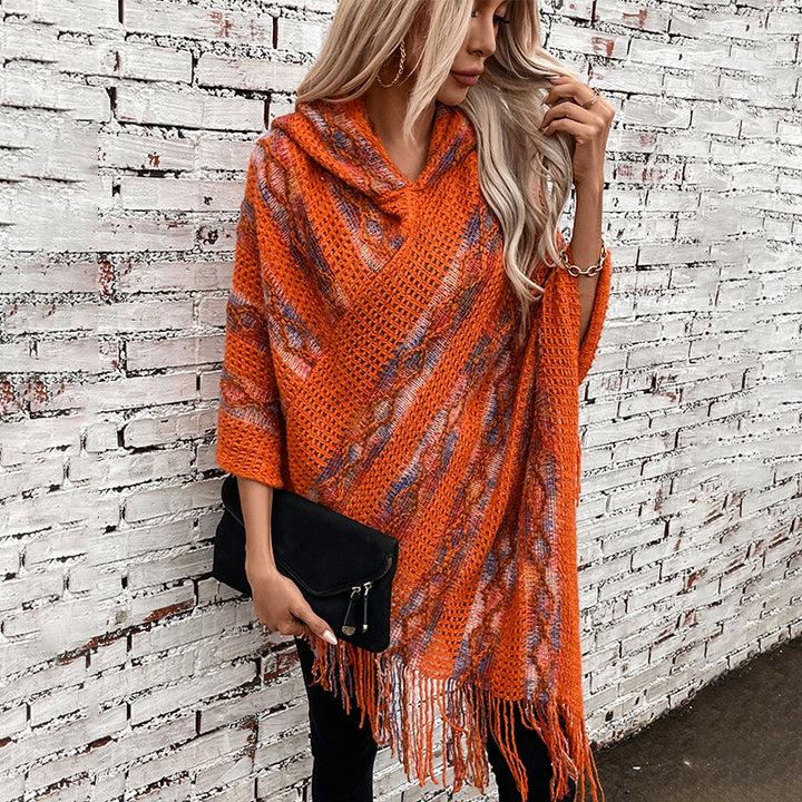 Ladies knitted poncho with hood and fringe design Lune London