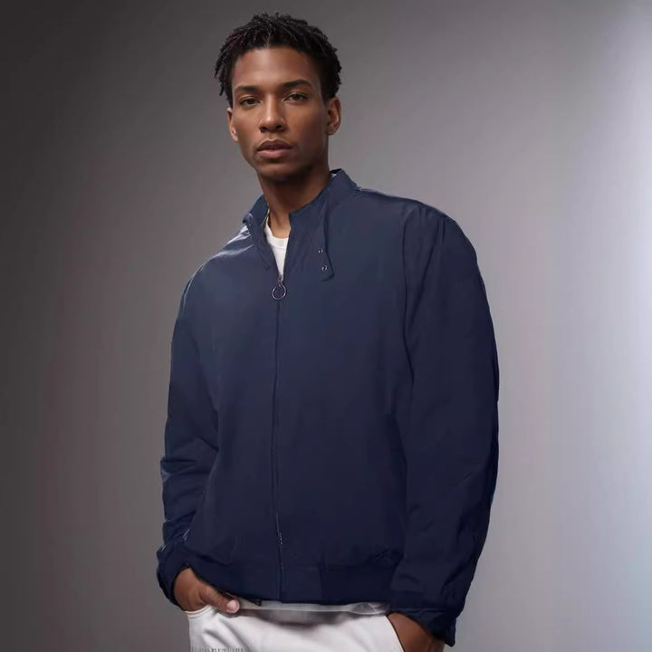 Versatile transition jacket for men with practical pockets and modern high collar Lune London