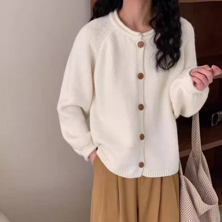 Knitted jacket for women with asymmetrical cut and generous balloon sleeves Lune London