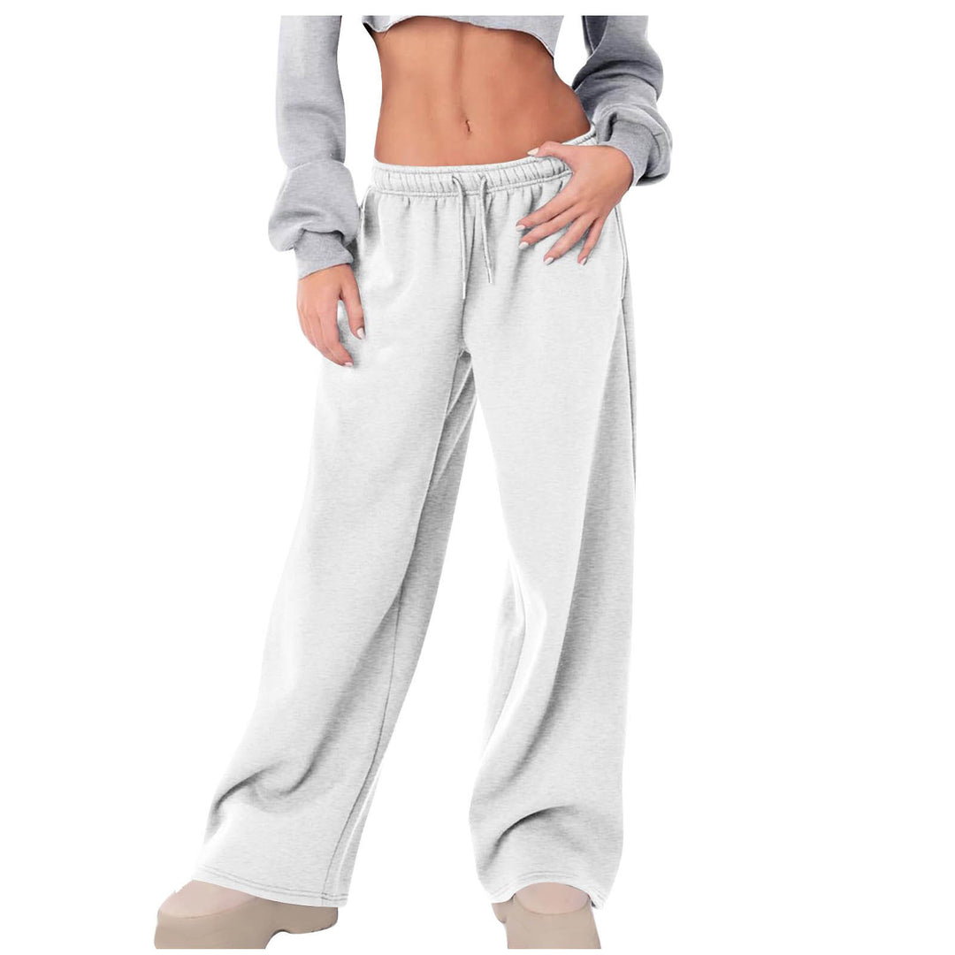Women's loose casual pants with elastic waistband and side pockets Chic & Stil