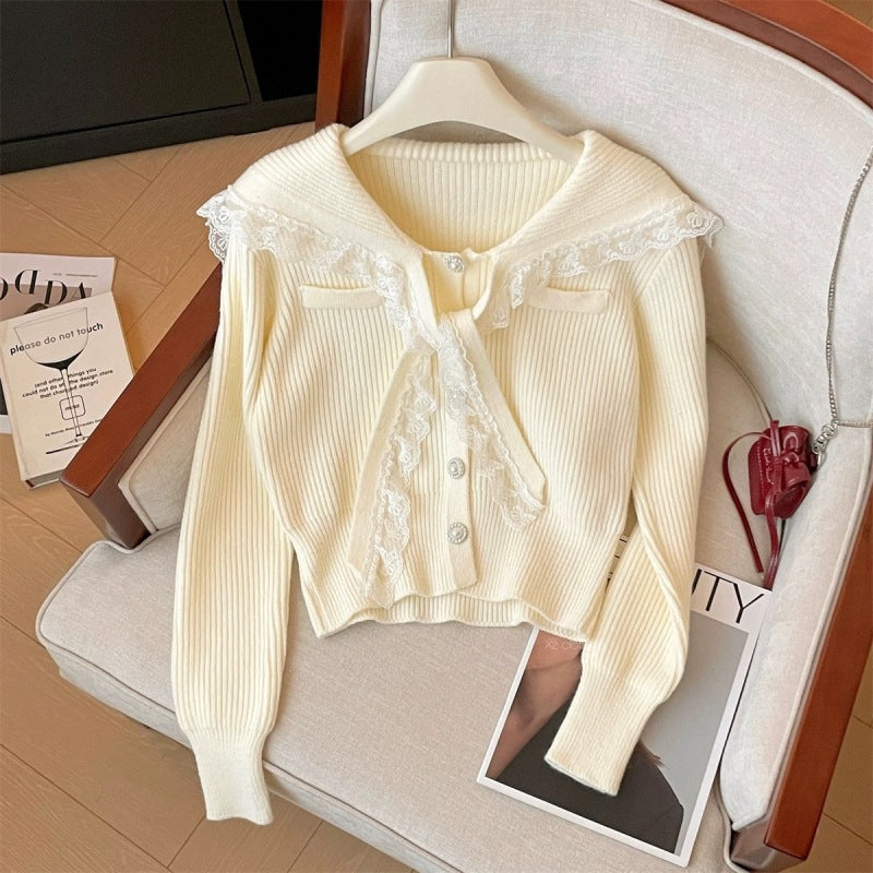 Knitted jacket for women with ruffled collar and decorative buttons Lune London