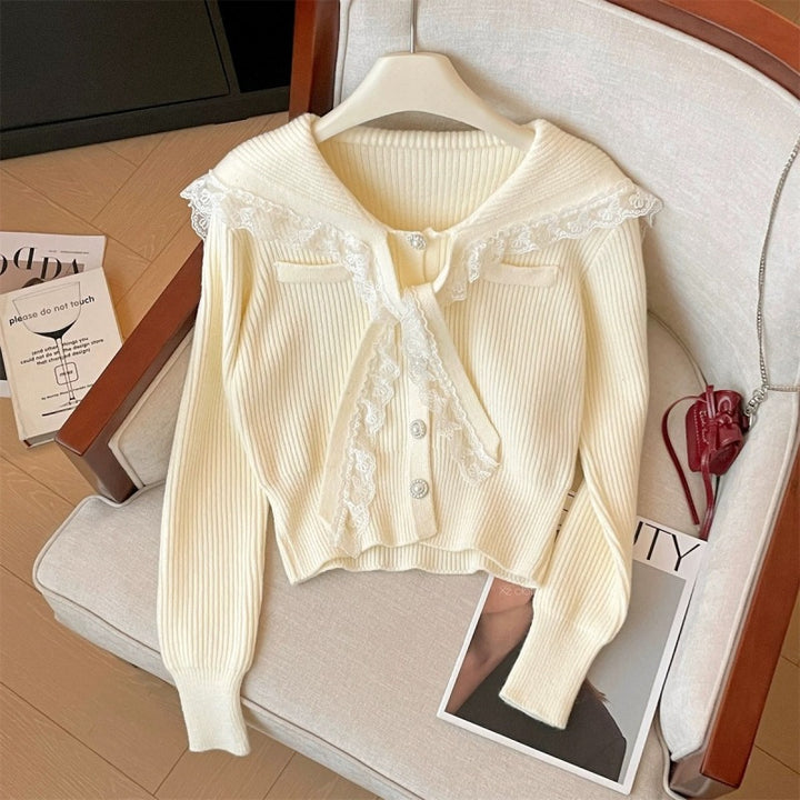 Knitted jacket for women with ruffled collar and decorative buttons Lune London