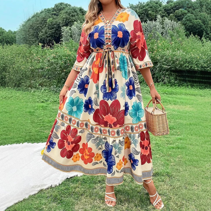 Women's maxi dress with colorful floral design and waist belt Lune London