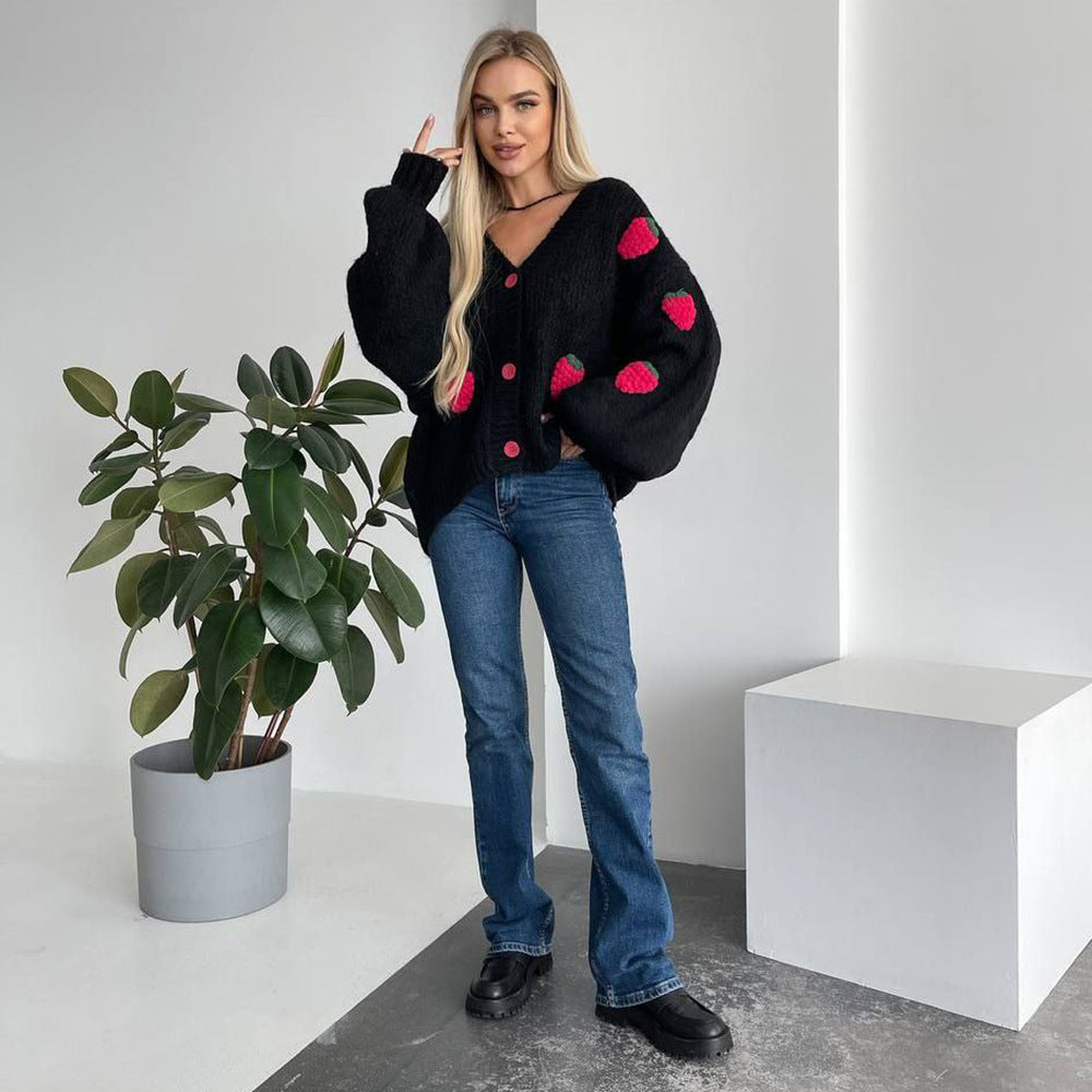 Women's knitted jacket with a playful strawberry pattern and wide sleeves Lune London