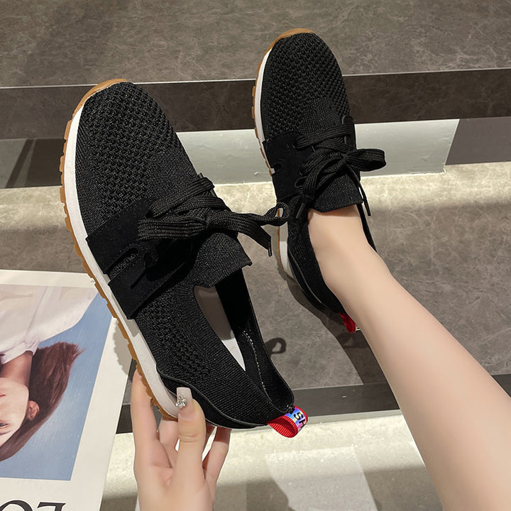 Women's sports sneakers with a breathable knitted upper and elastic accents Lune London