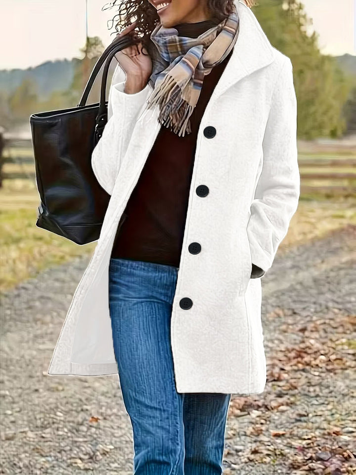 Manteau en laine élégant pour femmes avec col moderne et poches pratiques Chic & Stil