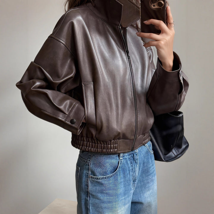 Oversized synthetic leather jacket for women with a modern look featuring a convenient zipper and elastic waist Lune London