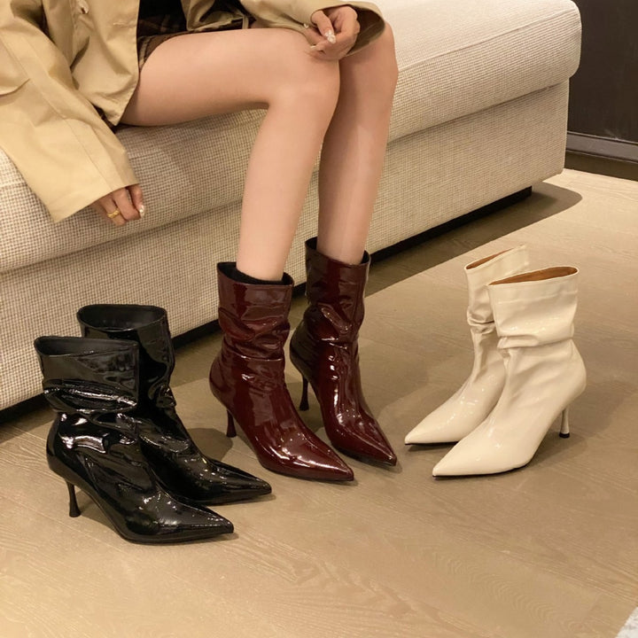 Elegant ladies boots with pointed toe and innovative pleated design Lune London