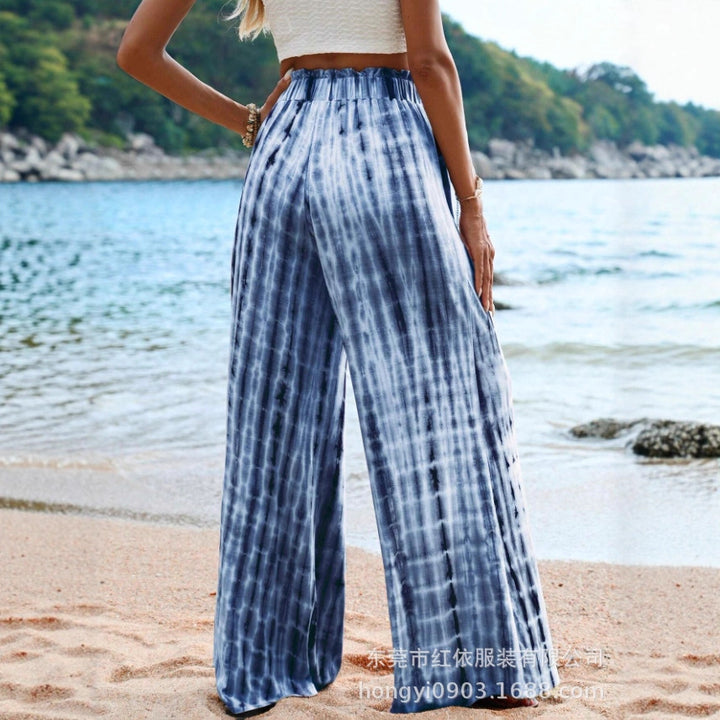 Pantalon d'été ample pour femmes avec taille élastique et motif batik unique Chic & Stil