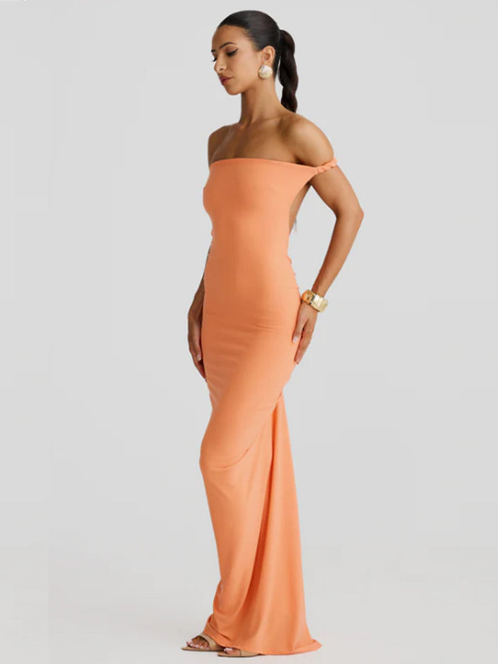 Women figure-hugging evening dress with elegant halter design and swinging hem Lune London