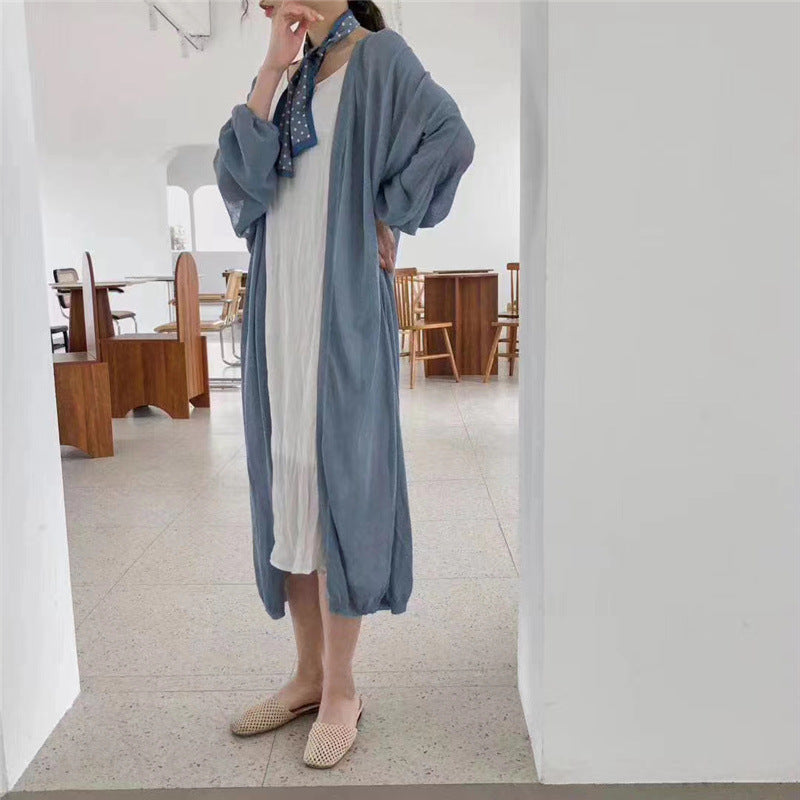 Cardigan long élégant pour femmes avec des manches en forme de ballon et un devant ouvert Chic & Stil