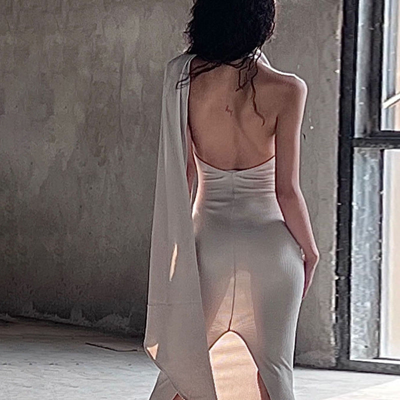 Elegant one-shoulder maxi dress for women with split hem and flowy design Lune London