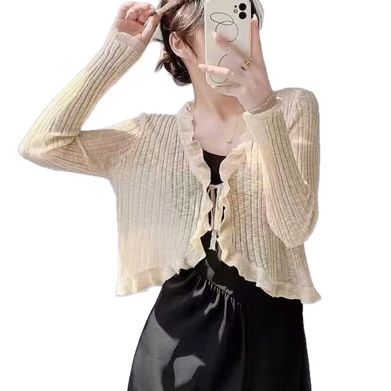 Women's knitted jacket with ruffle details and airy structure Lune London