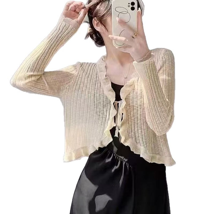 Women's knitted jacket with ruffle details and airy structure Lune London