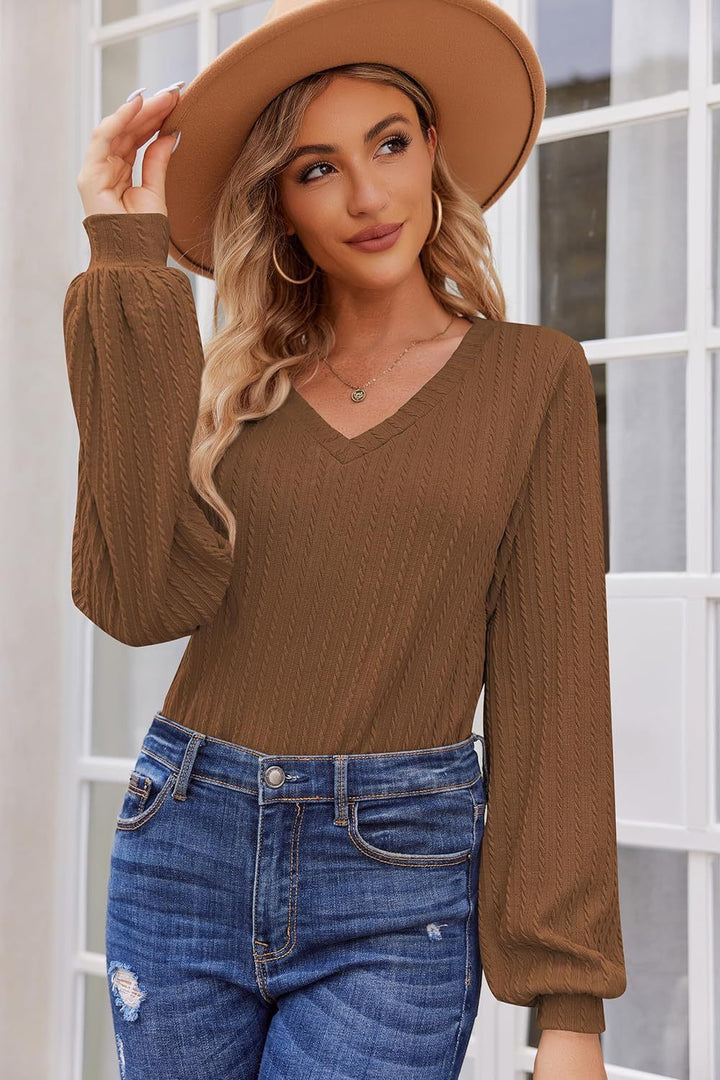 Women's knit sweater with a fine ribbed texture and a casual V-neck Lune London