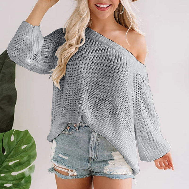 Ladies off-shoulder knit pullover with flared hem Lune London