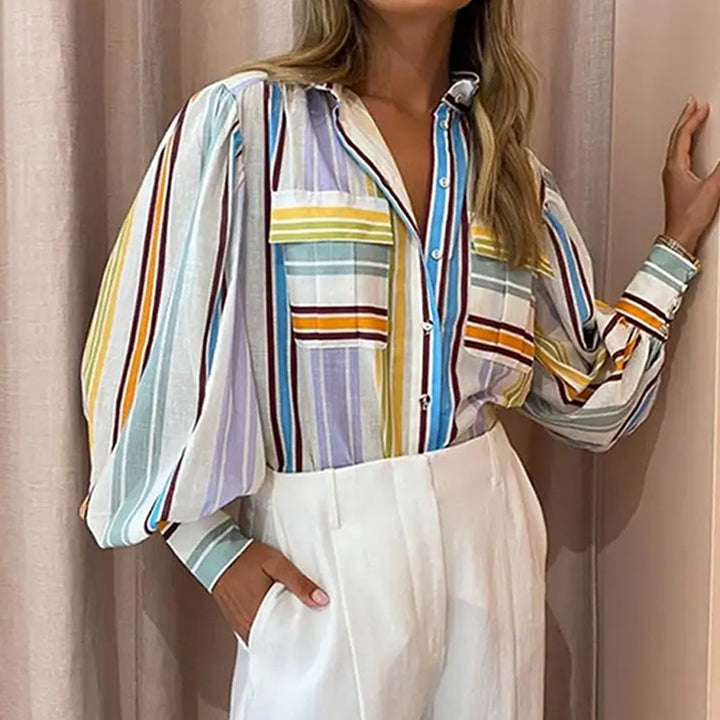 Blouse décontractée pour femmes avec des manches bouffantes élégantes et des motifs rayés Chic & Stil