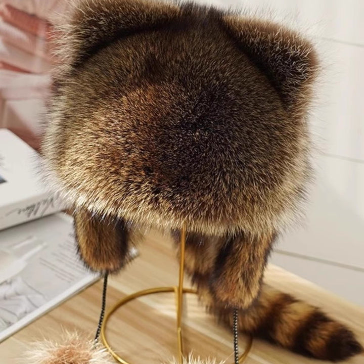 Ladies fashionable fur cap with ear protection and pom-poms Lune London