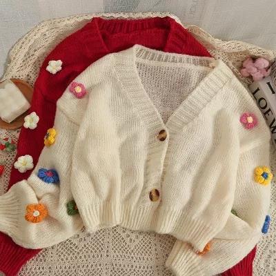 Ladies cozy knit cardigan with playful floral appliqués Lune London
