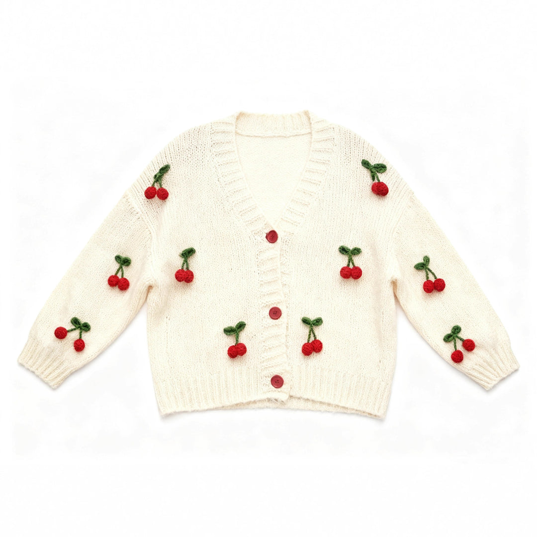 Knitted jacket for women with a cheerful cherry design and practical button details Lune London