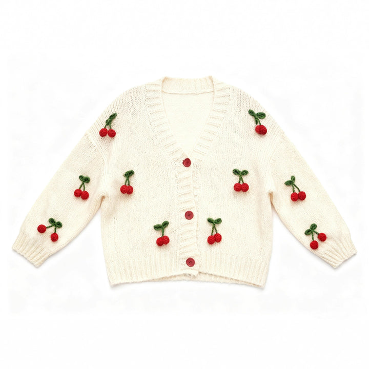Knitted jacket for women with a cheerful cherry design and practical button details Lune London