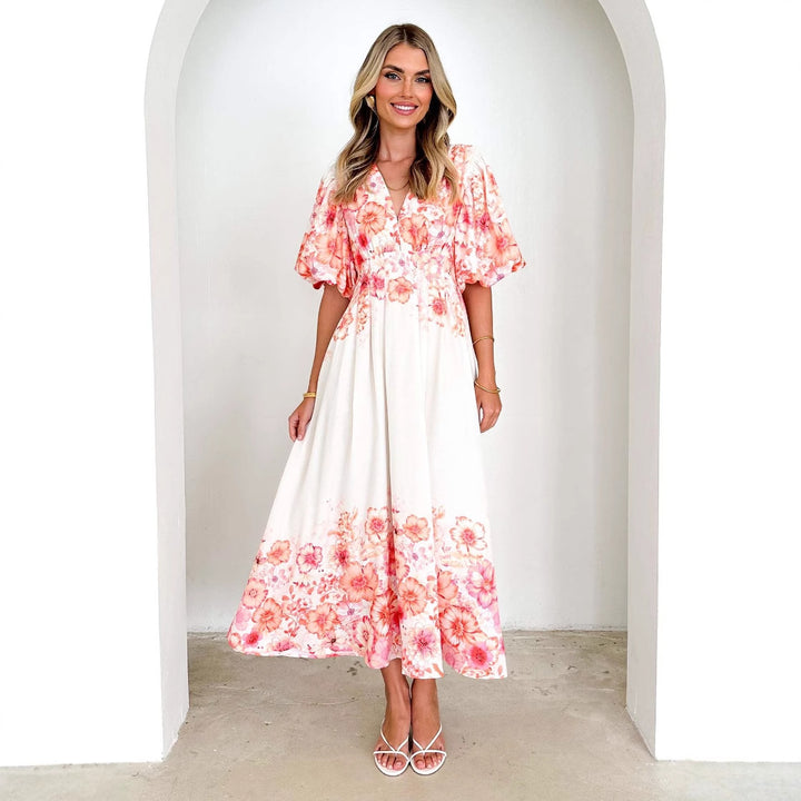 Maxi dress for women with voluminous puff sleeves and floral design Chic & Stil