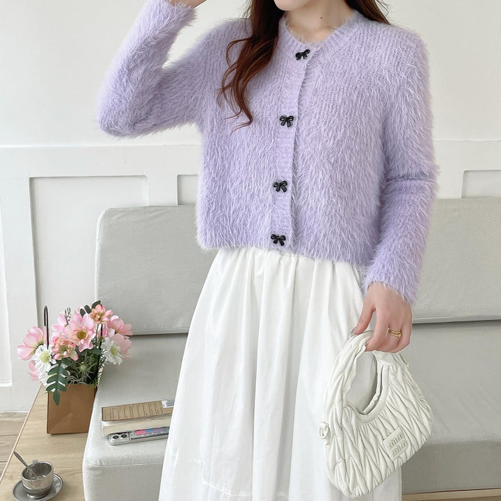 Women's cozy wool pullover with decorative bow buttons Lune London