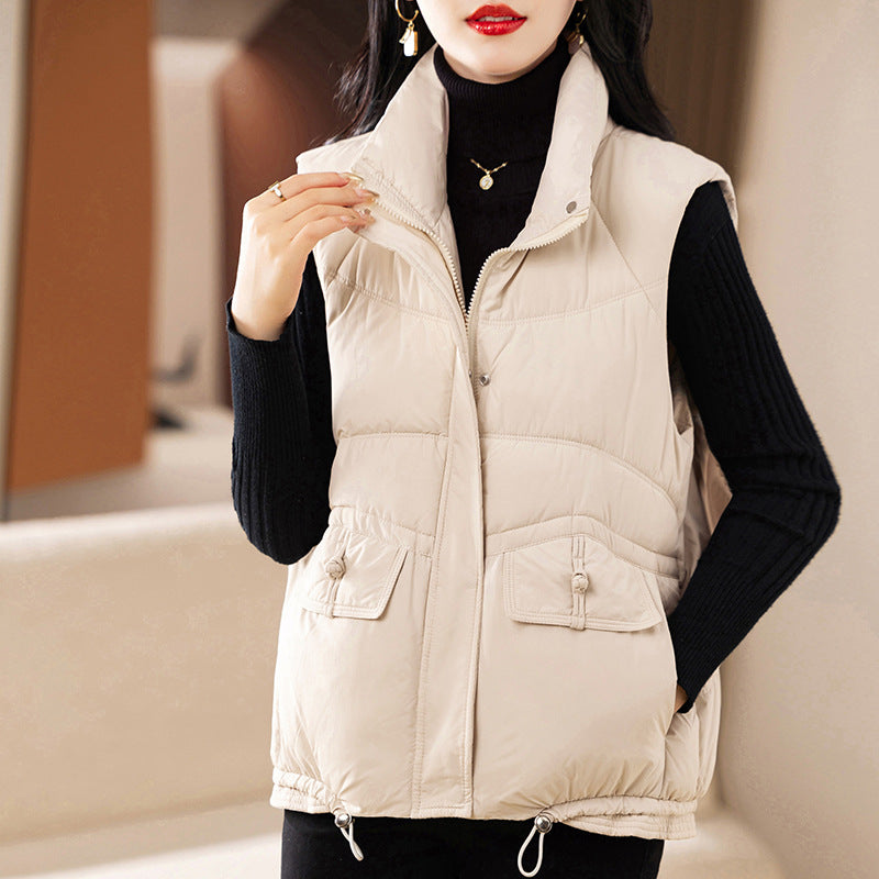 Quilted vest for women with practical pockets and adjustable hem Lune London