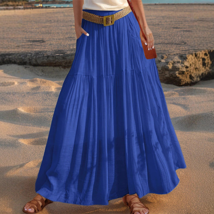 Maxi flared skirt for women with elegant pleated draping and practical pockets Lune London