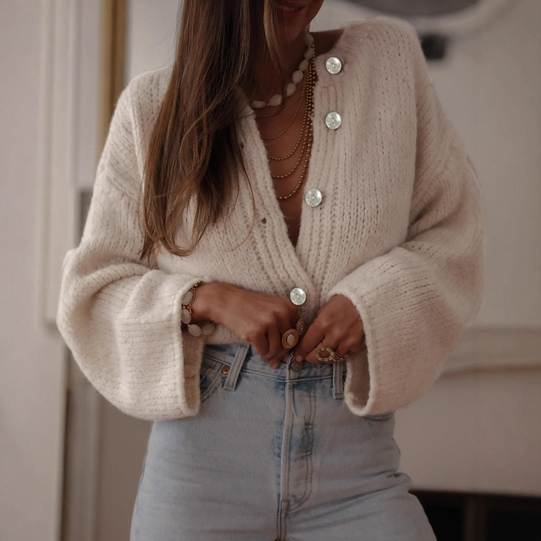 Ladies comfortable pullover with oversized sleeves and elegant pearl buttons Lune London