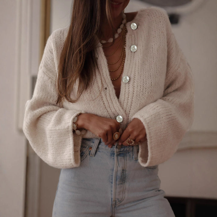 Ladies comfortable pullover with oversized sleeves and elegant pearl buttons Lune London