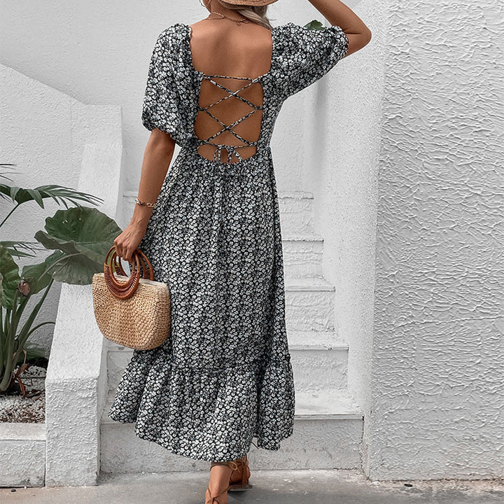 Maxi dress for women with floral print and crossed back detail Lune London
