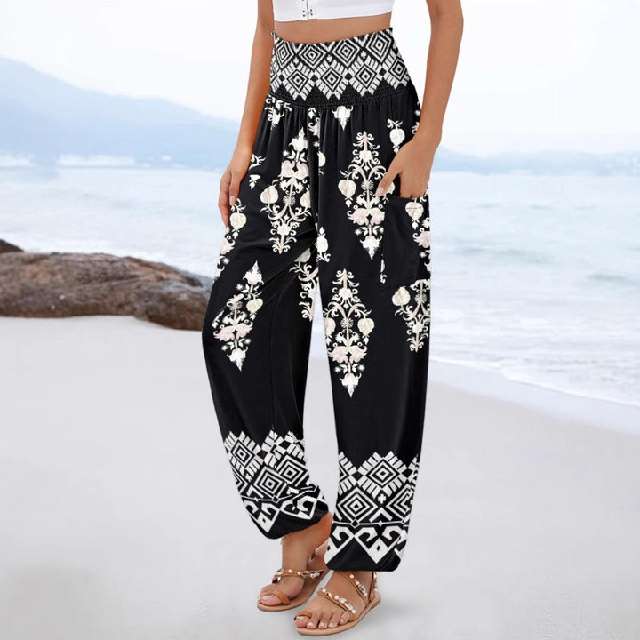 Wide Palazzo pants for women with colorful Paisley pattern and elastic waistband Lune London