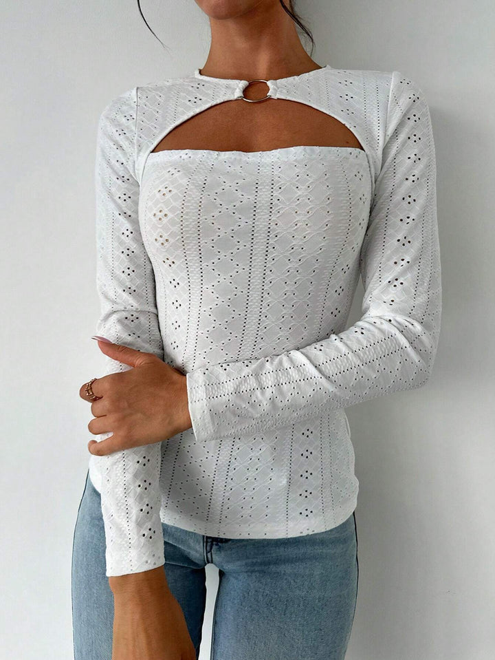 Chemise à manches longues pour femmes avec des détails découpés décoratifs et un tissu en coton confortable Chic & Stil