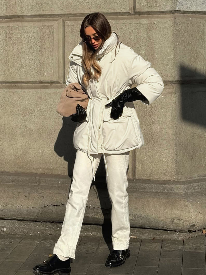 Quilted winter jacket for women with high collar and practical drawstring waist Lune London