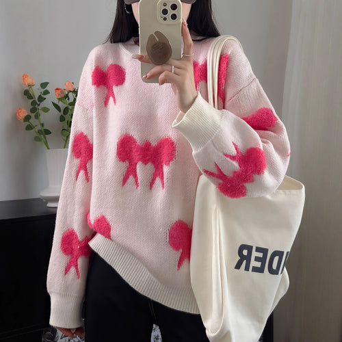 Cozy knitted sweater for women with playful bow pattern Lune London