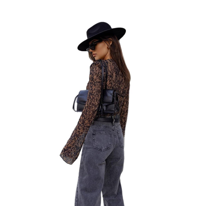 Blouse transparente pour femmes avec manches longues imprimée léopard et décolleté en V Chic & Stil