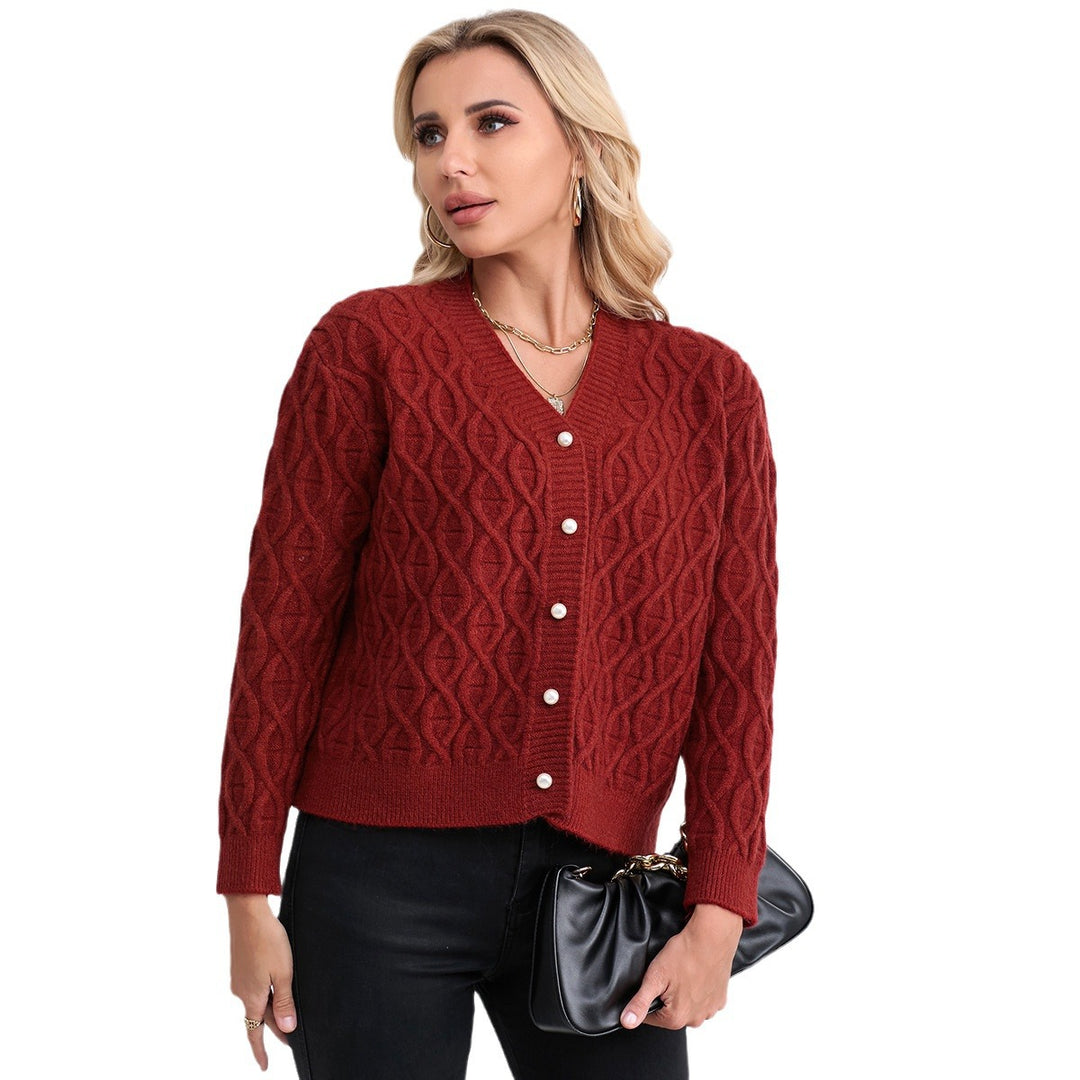 Women's knit jacket with modern cable pattern and pastel button details Lune London