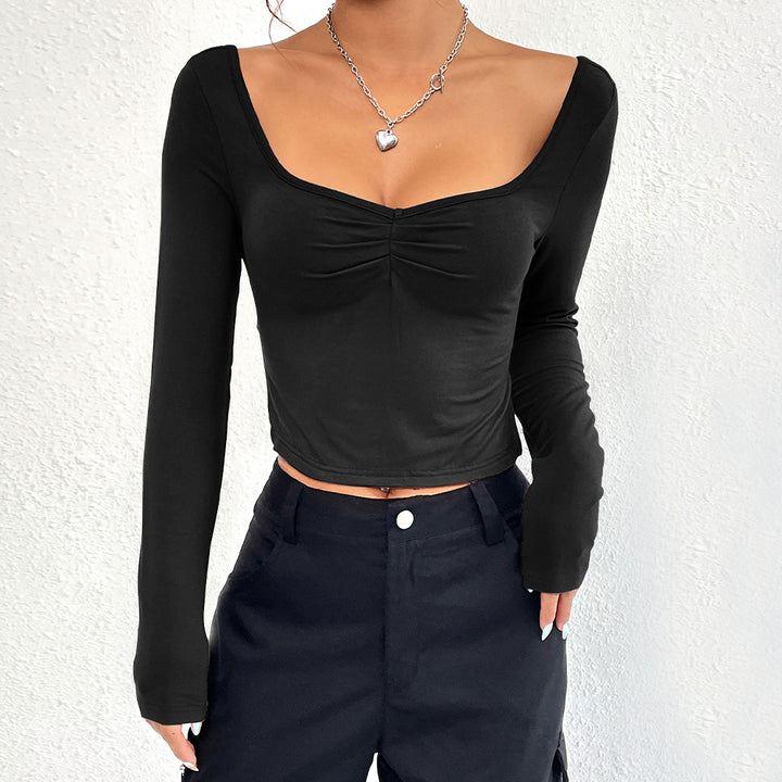 Chic & Stil Elegant long-sleeve cropped top for women with a stylish ruched effect