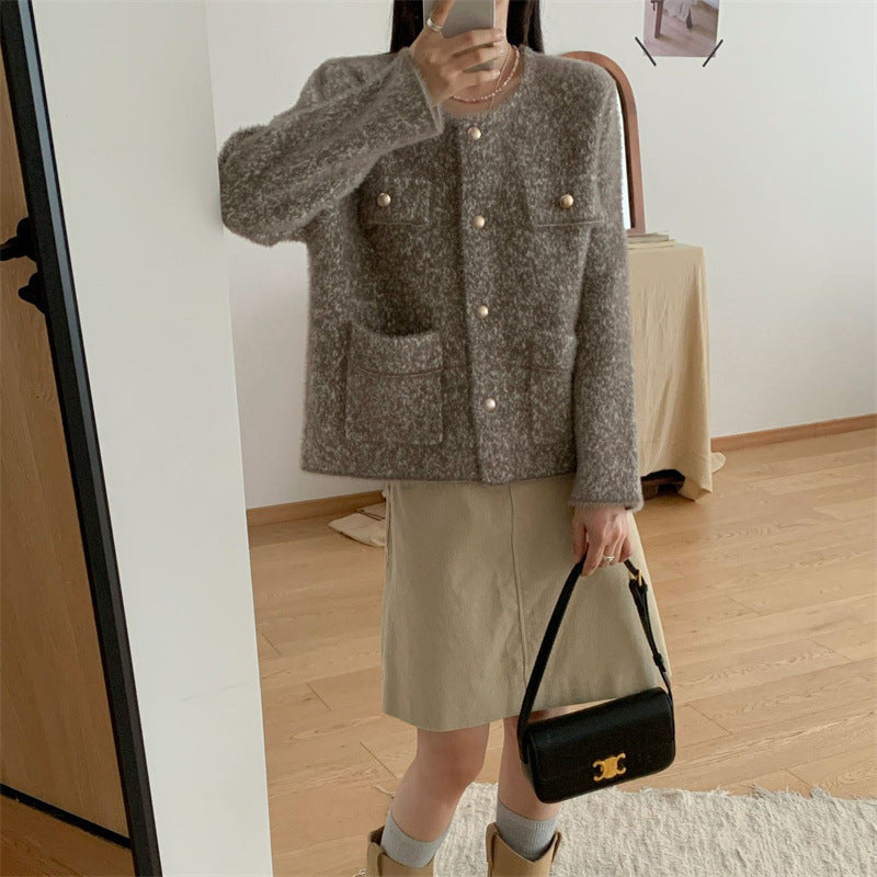 Femmes gilet douillet avec boutons en perles et poches pratiques Chic & Stil