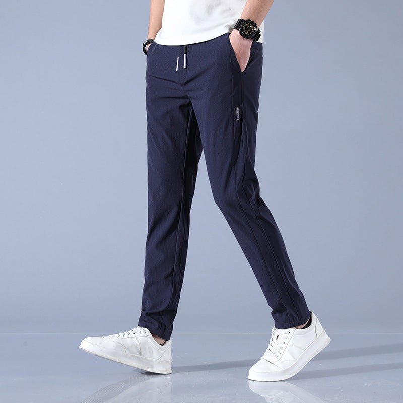 Men's sports pants with adjustable drawstring and zippered pockets on the sides Lune London